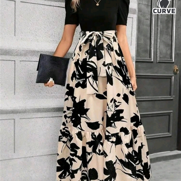Dresses & Skirts - Chic Black and Cream Floral Midi Dress